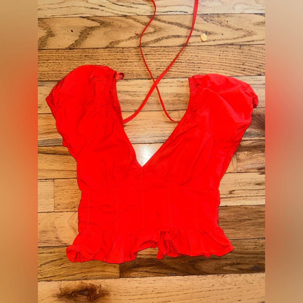 Bright orange, puffed sleeves shirt